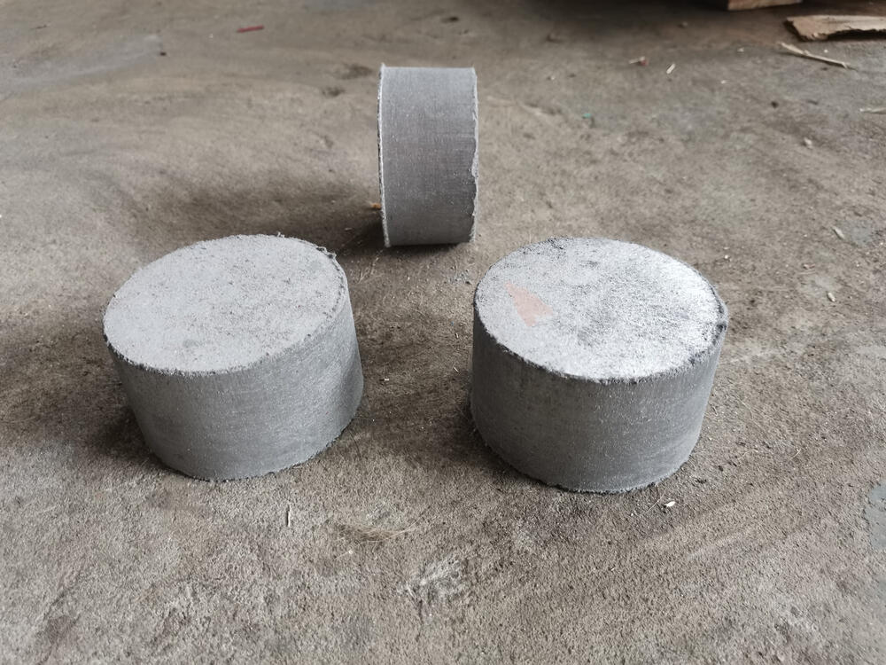 Three cylindrical metal briquettes, supplied output-form example