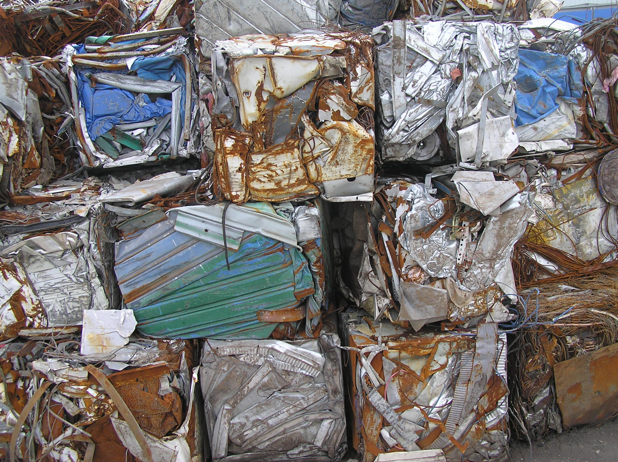 Compacted scrap metal bales