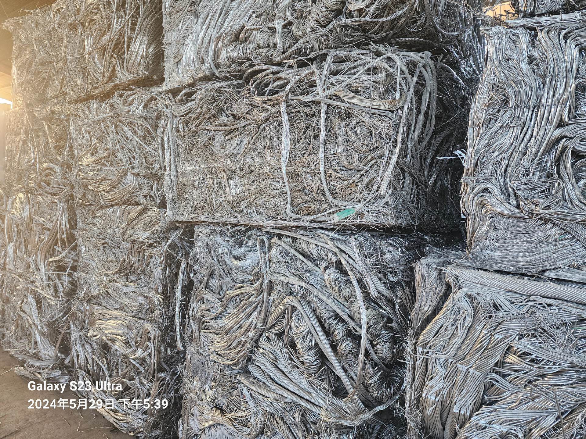 Stacked compacted wire scrap bales